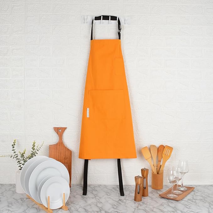 Cotton Canvas Apron for Women & Men – Adjustable Neck Strap & Waist Ties with Pockets – Kitchen, Cooking, Baking, Chef, BBQ, Grilling, Gardening – Durable 33x27 Inches – Orange with Black Straps